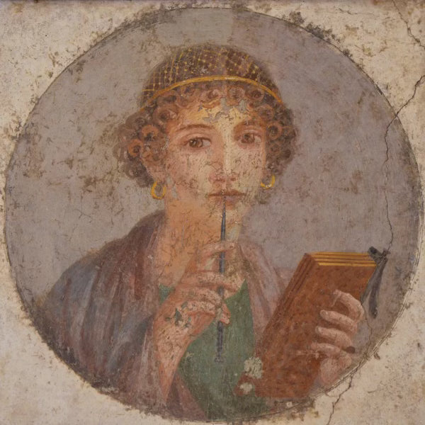 Ancient fresco of a woman with curly hair and gold earrings holding a stylus and wax tablet