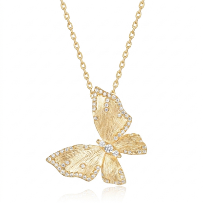 Gold butterfly necklace with diamonds on a white background